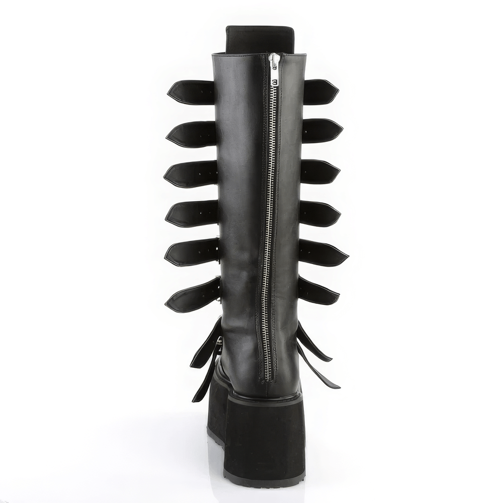 Demonia black knee-high platform boots with buckle straps and back zipper, showcasing a bold gothic style.