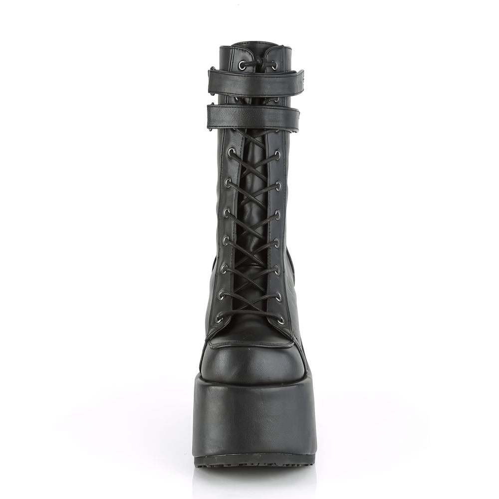 Demonia black lace-up mid-calf boots with chunky heel and adjustable straps, showcasing bold vegan leather style.