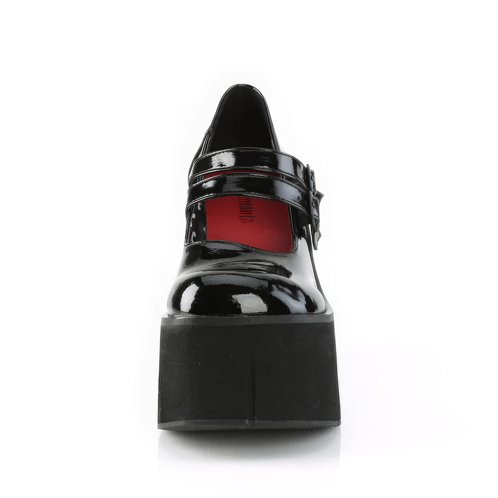 Front view of stylish black patent double-strap platform Mary Janes with an impressive height boost.