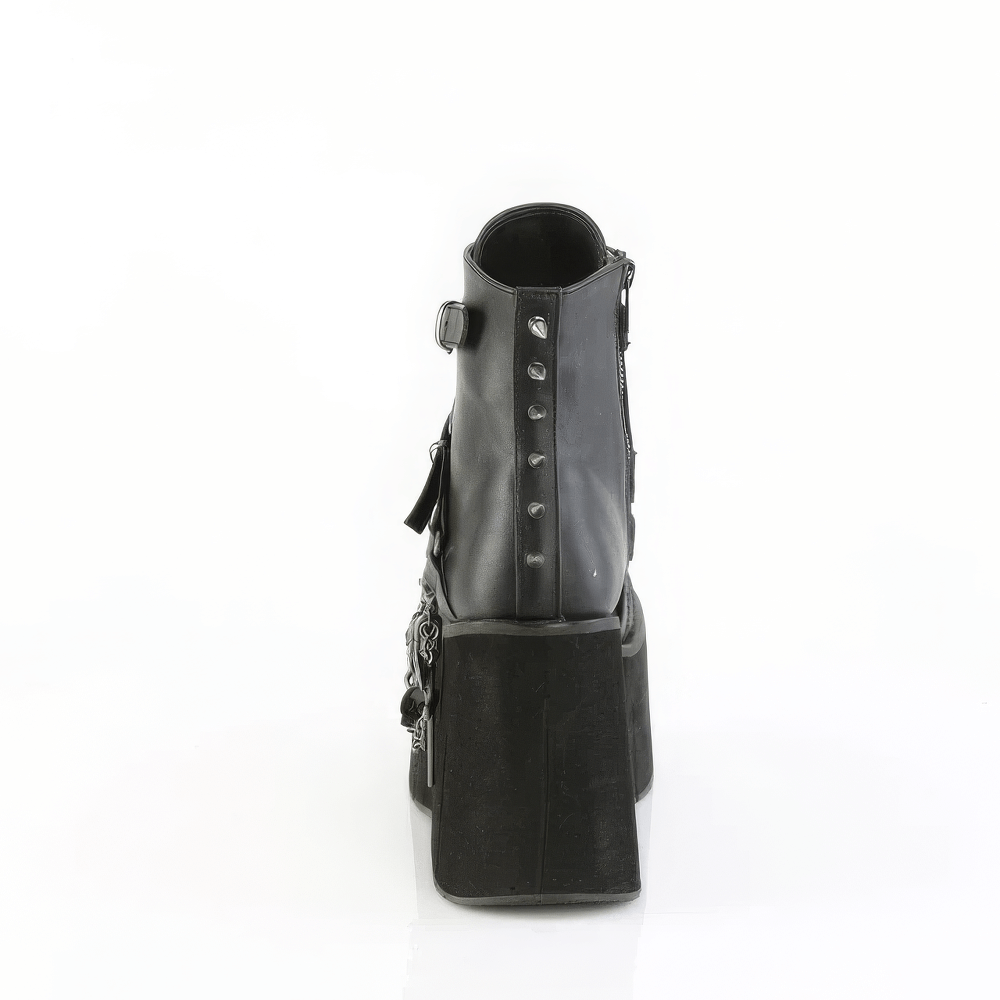 Back view of Demonia black platform ankle boots featuring chain details and pentagram embellishments.