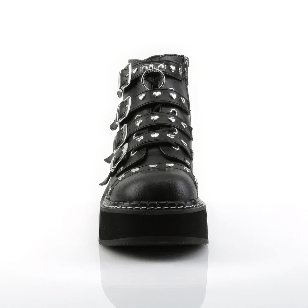 Demonia black platform buckle strap boots with heart studs and O-ring, front view showcasing edgy style.