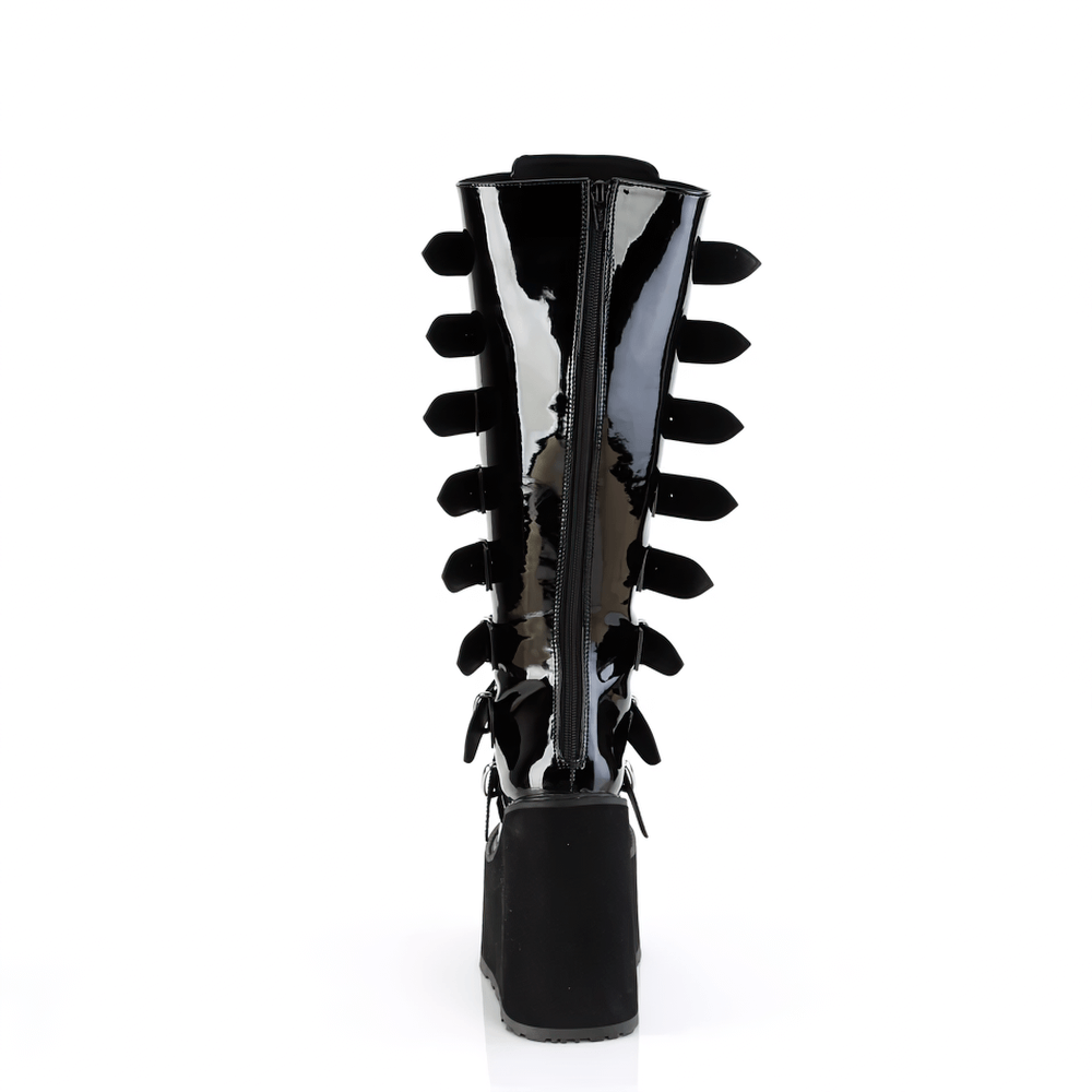 Rear view of DEMONIA black platform calf knee-high boots with buckle straps and back zip closure.