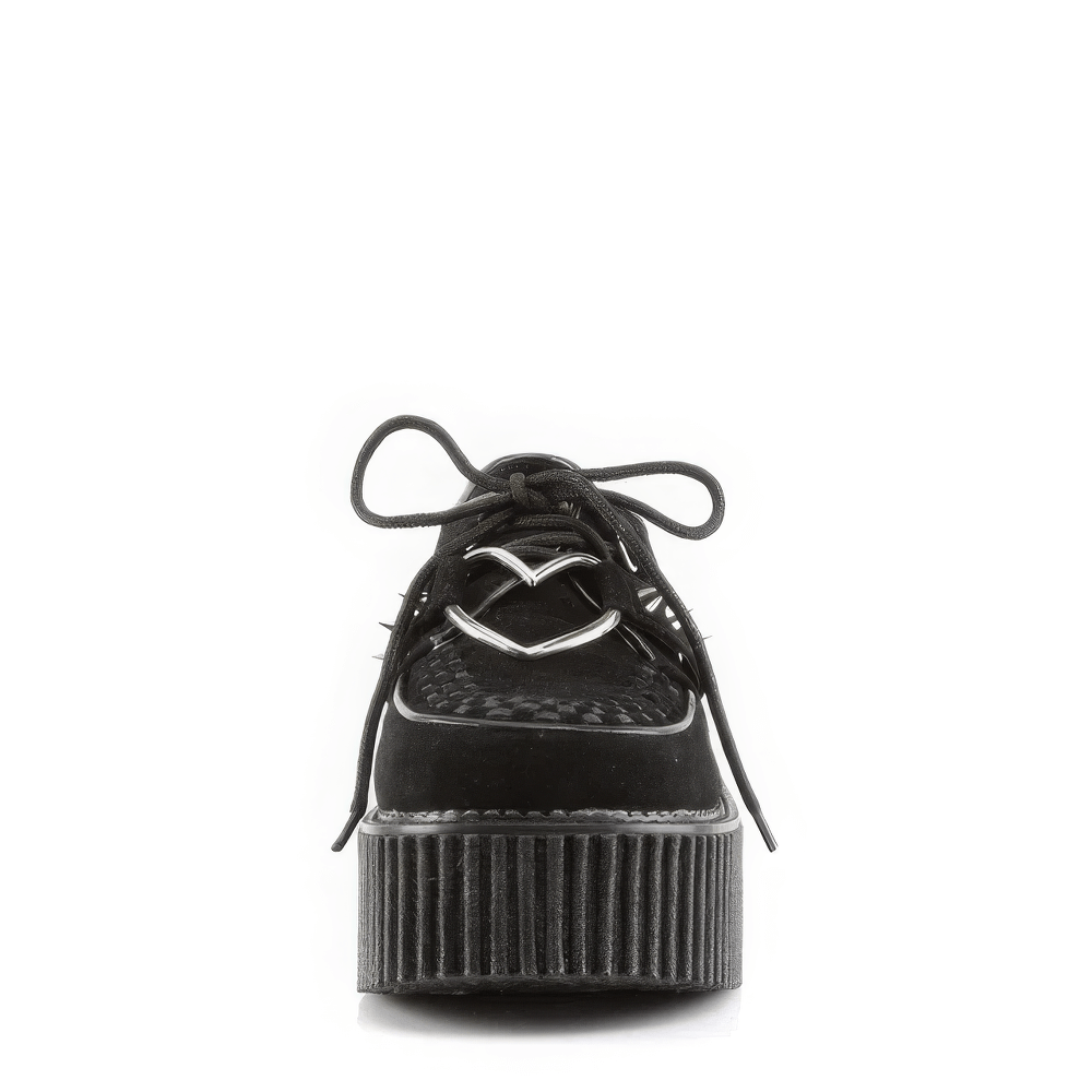 Daring black platform creepers with heart O-ring and studded details, front view showcasing edgy style.