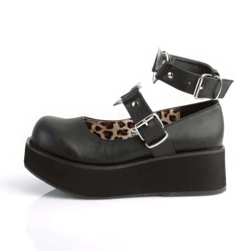 Black platform Mary Jane shoes with buckled ankle straps and leopard print interior.