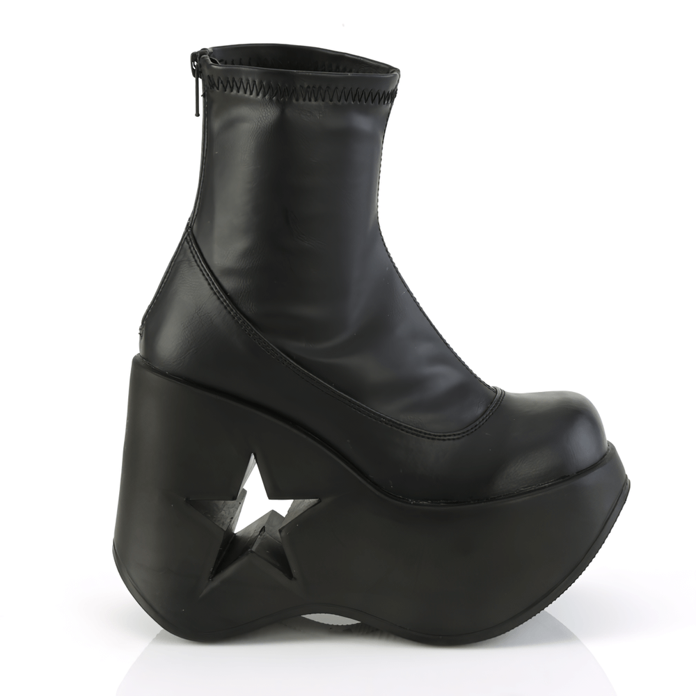 Demonia black star platform ankle boots with zip, featuring a sleek design and 5-inch star cutout wedge heel.