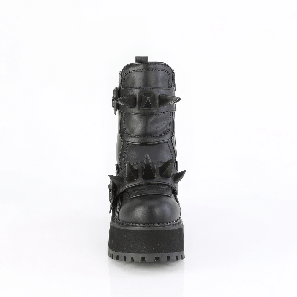 Black vegan leather ankle boots with claw spikes and coffin buckles for edgy fashion.