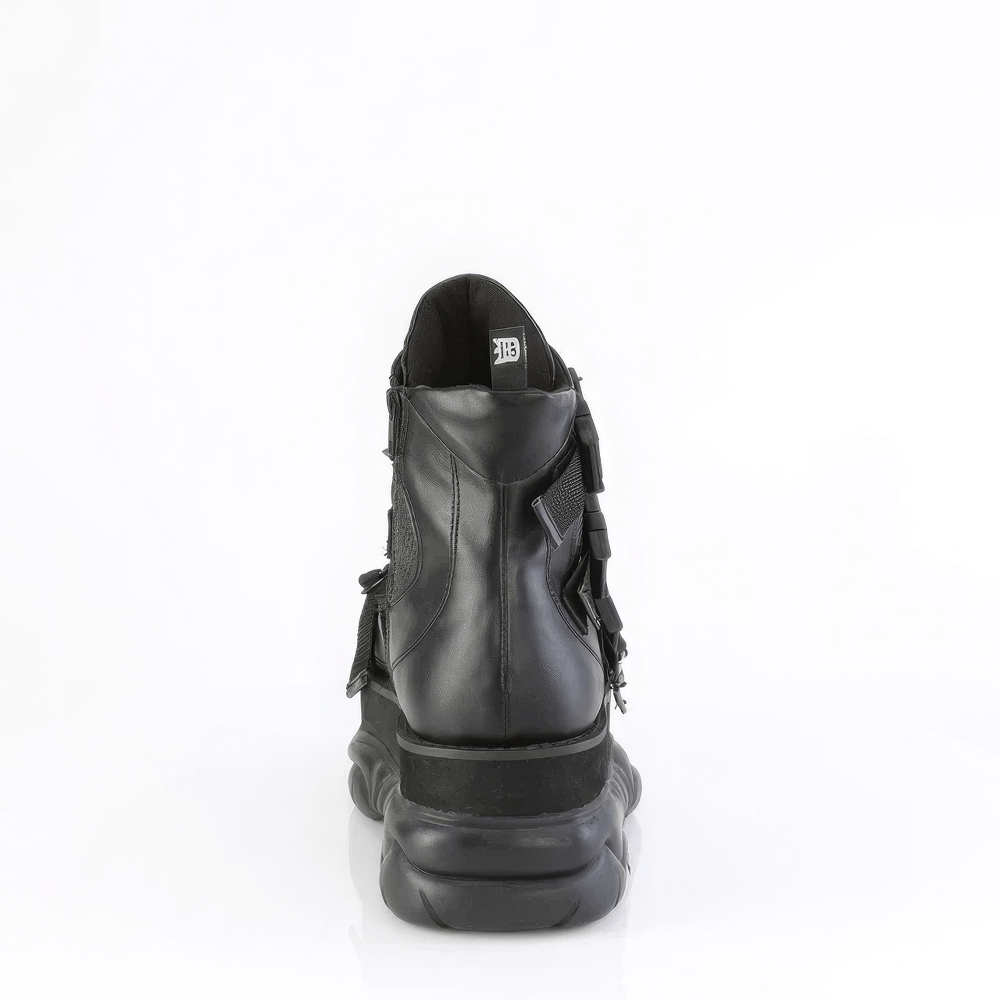 Back view of DEMONIA Black Studded Shield Platform Ankle Boot showcasing claw spikes and buckle details.