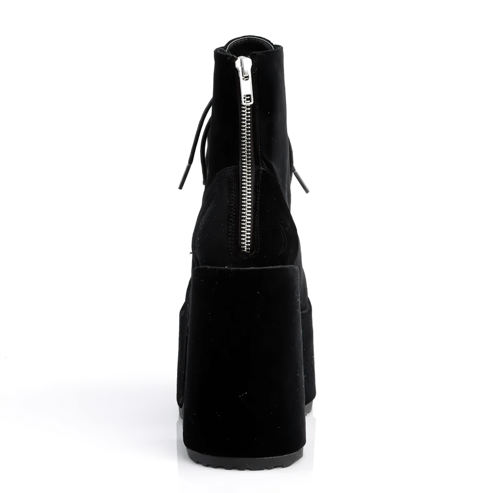 Demonia black velvet lace-up ankle boots showing chunky heel and metal zip closure from the back.