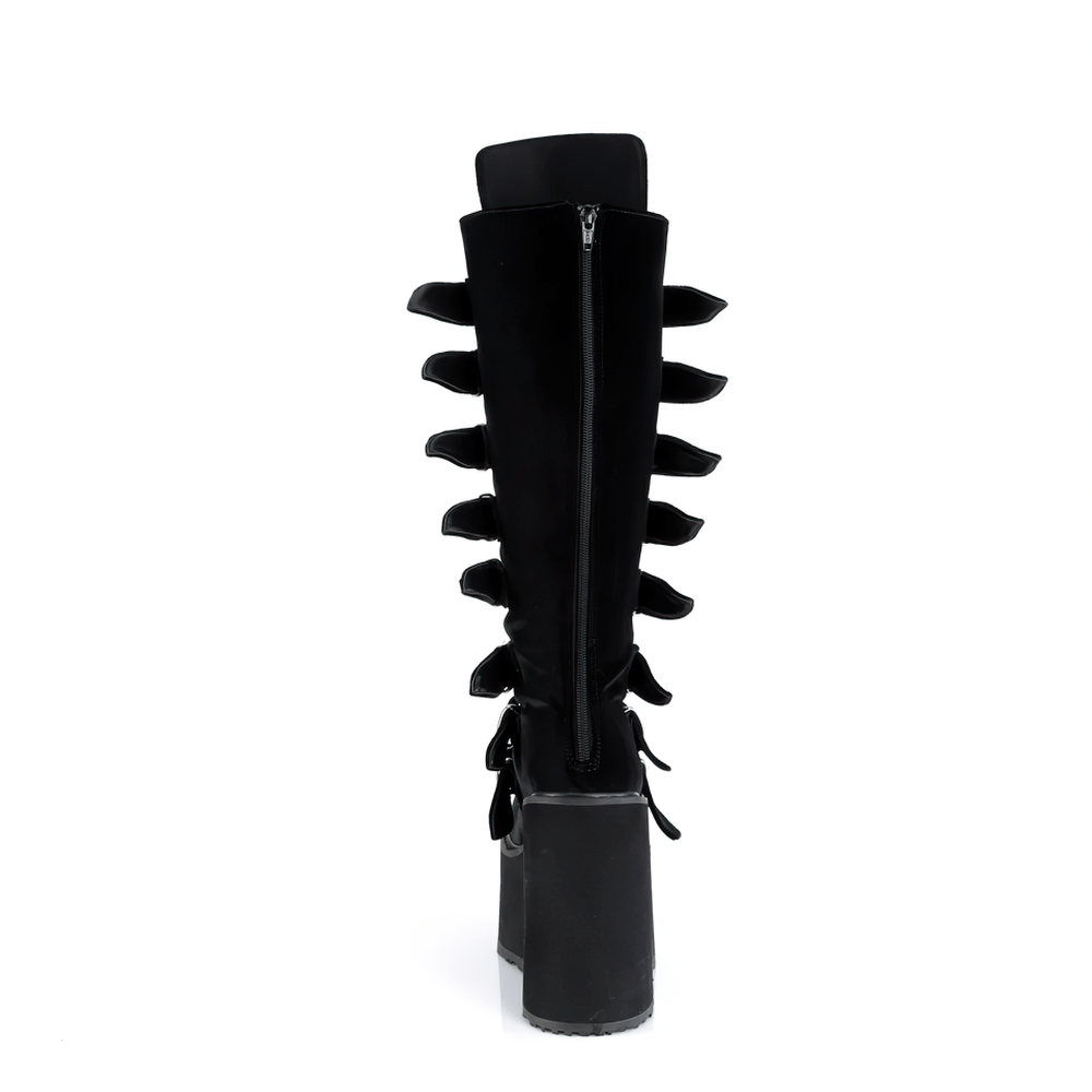Back view of DEMONIA black velvet platform knee-high boots featuring bold buckle straps and a striking design.