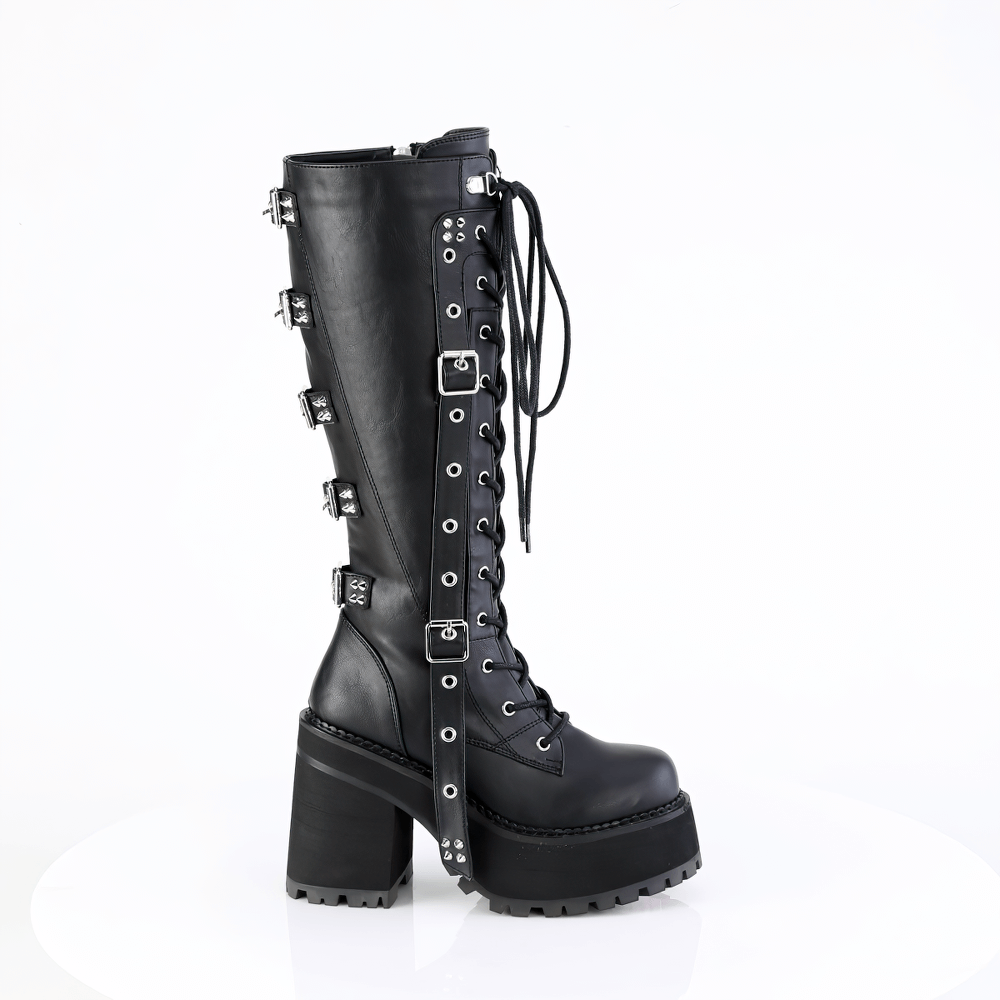 Black lace-up knee-high boots with spiked straps and block heel for an edgy style.