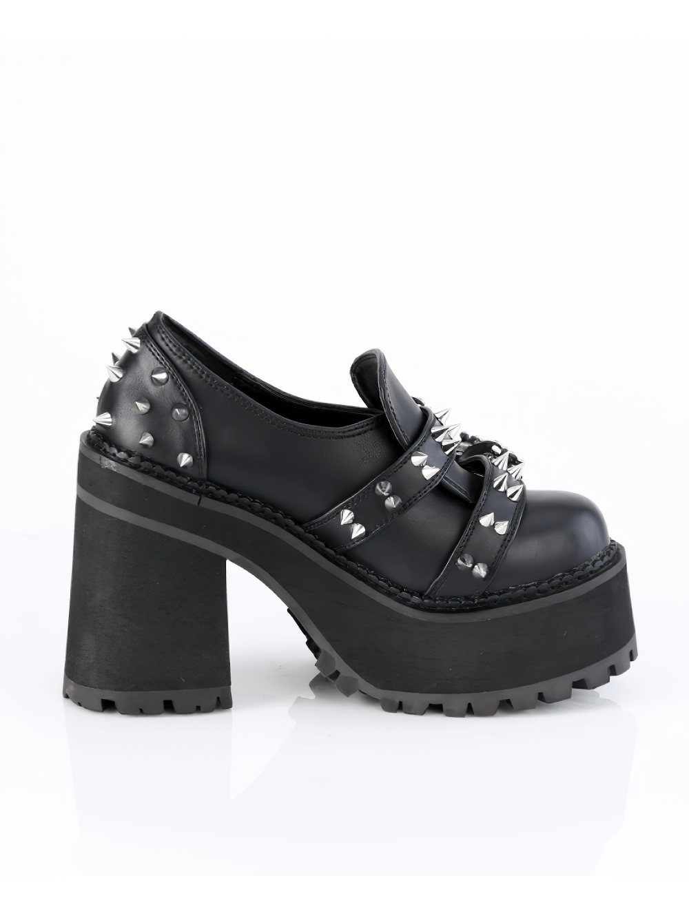 Bold black Demonia platform loafers with double skull buckles and spike studs adding edgy flair.