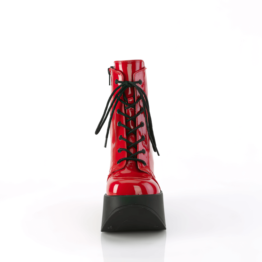 Bold red glossy lace-up ankle boot with 5" star platform wedge and zipper for easy wear.