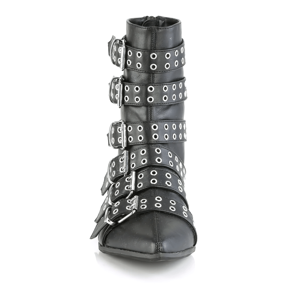 Daring black vegan leather calf-high boots with buckle straps and pointed toe, featuring a bold winklepicker style.