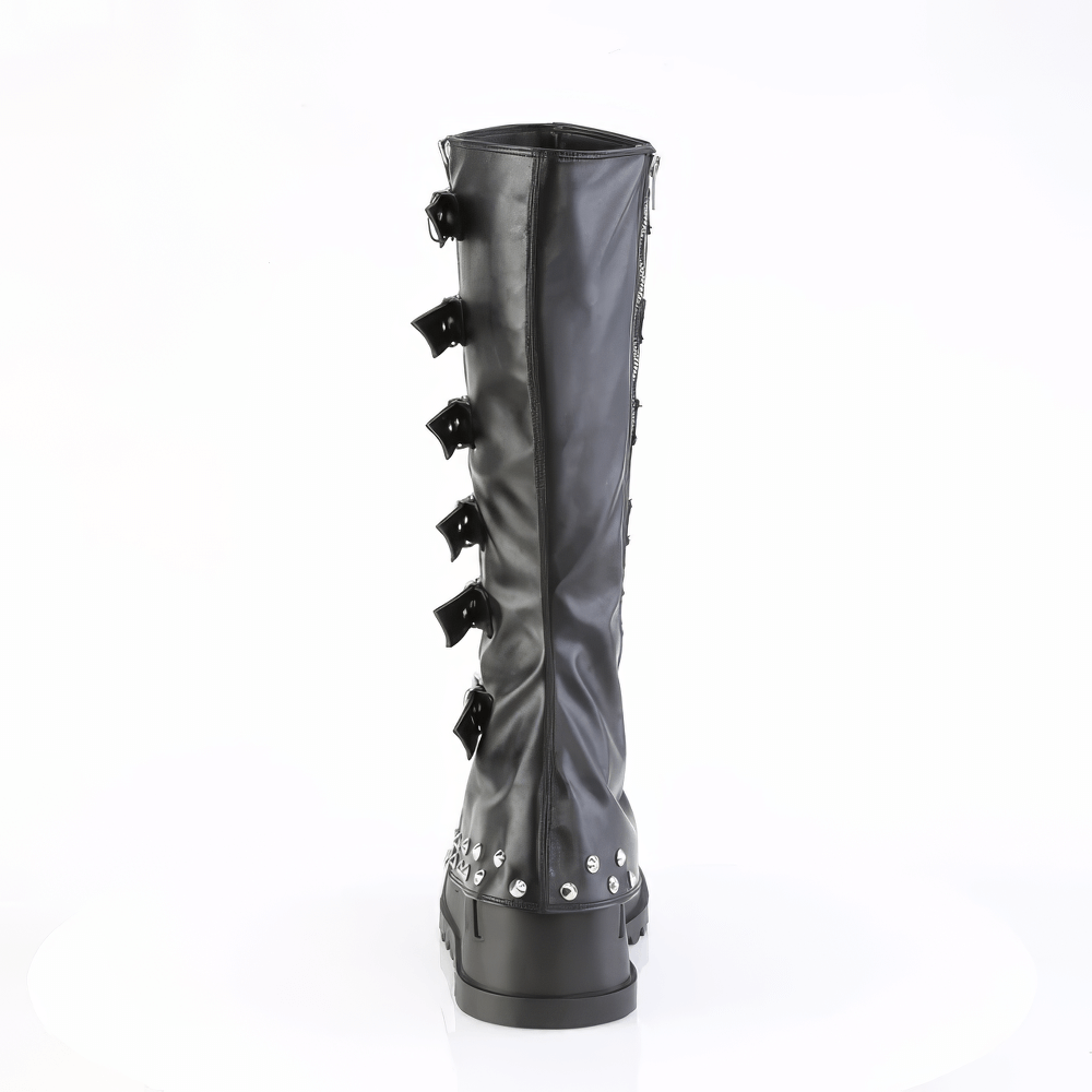 Back view of DEMONIA knee high boots with ornamental buckle straps and studded details, perfect for bold fashion.