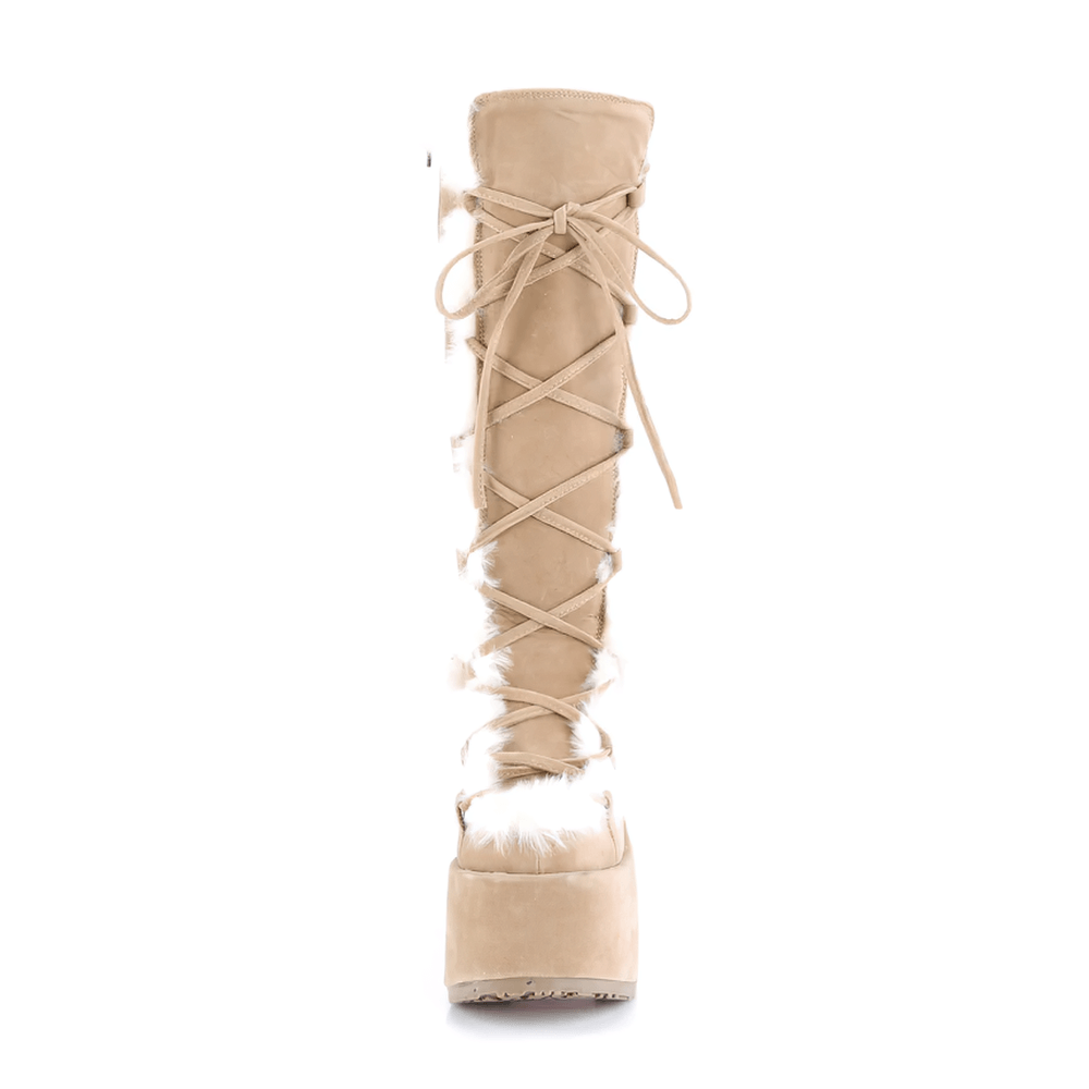 Demonia camel vegan suede knee-high boots with faux fur trim and lace-up design, featuring a 5-inch heel and 3-inch platform.