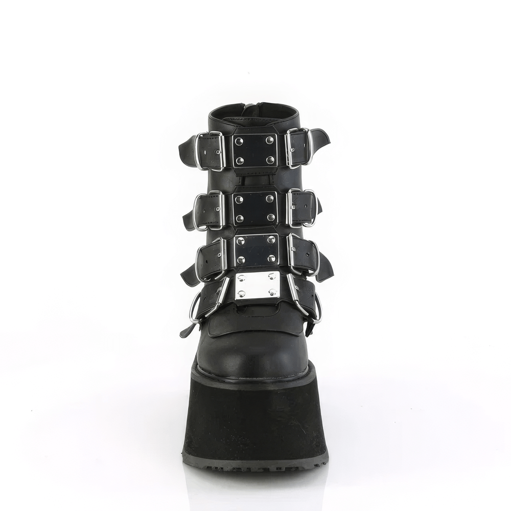 Demonia chunky platform ankle boots with metal plate accents and adjustable buckle straps.