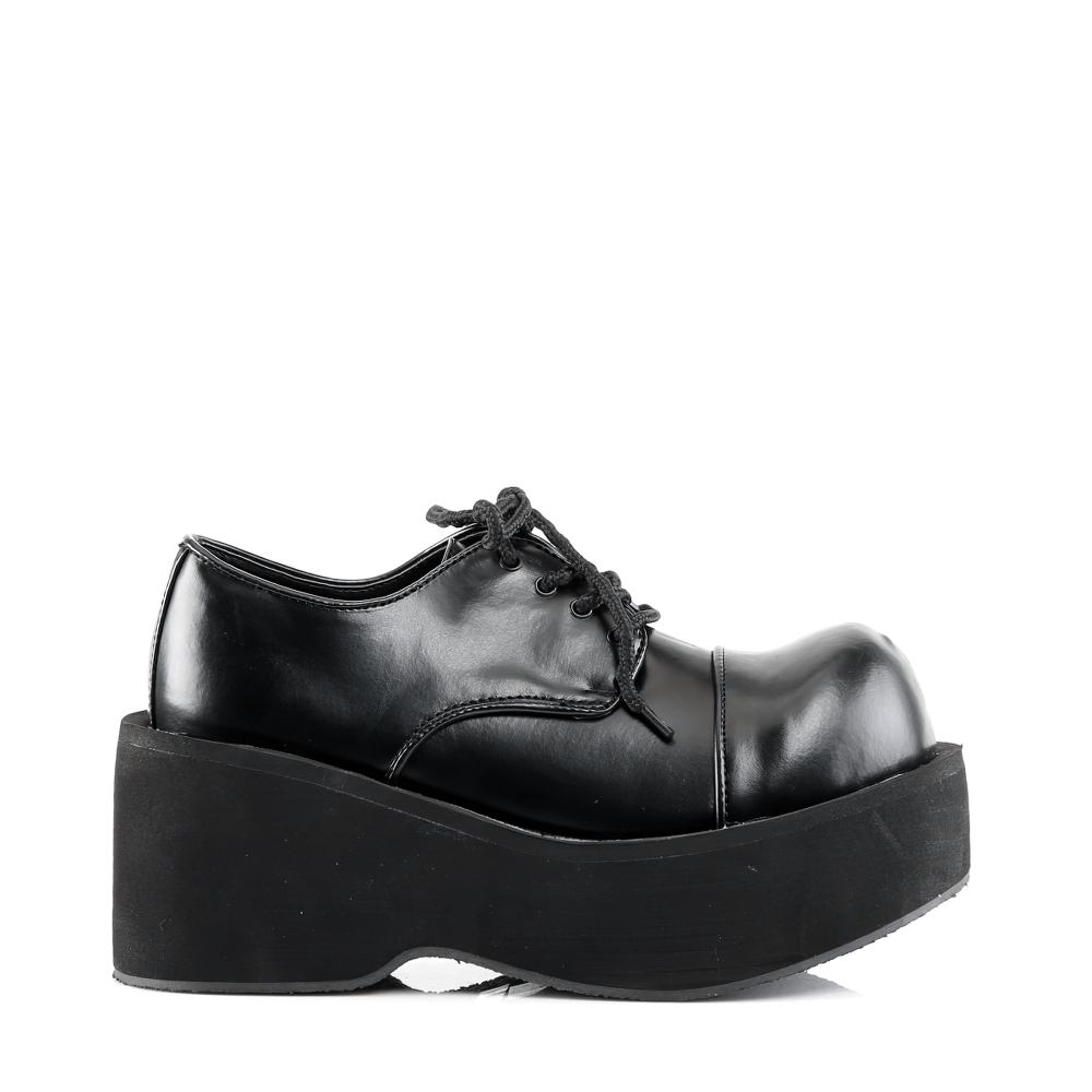 Bold black platform shoes with thick sole for goth punk rockabilly style, made from premium vegan leather.