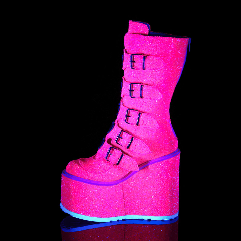 Sparkly pink platform mid-calf boots with heart buckles and a 5 1/2 inch platform, perfect for edgy fashion lovers.
