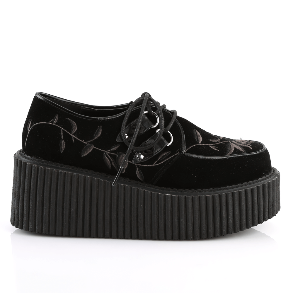 Demonia floral embroidered black lace-up creepers with a 3-inch platform, perfect for gothic chic fashion.