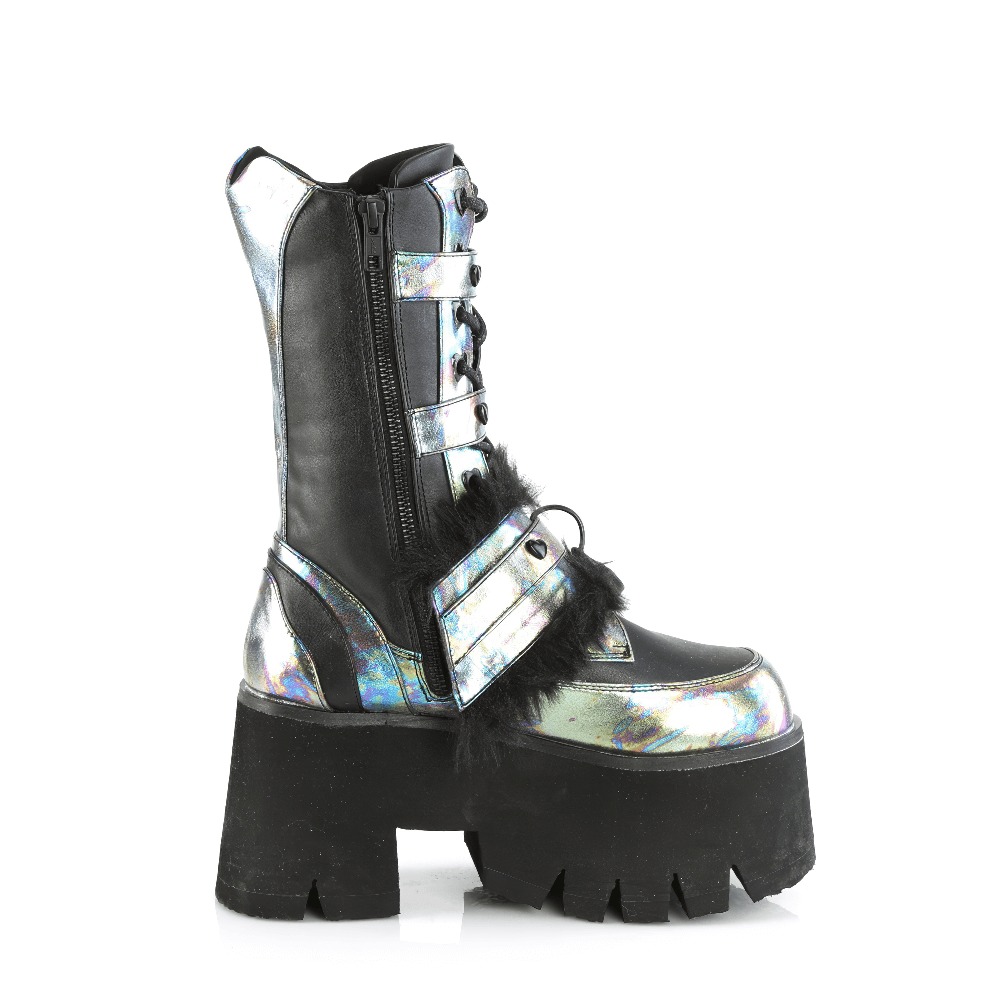 Demonia fur-lined chunky heel platform boot with heart studs and mid-calf rise in black and iridescent finish.