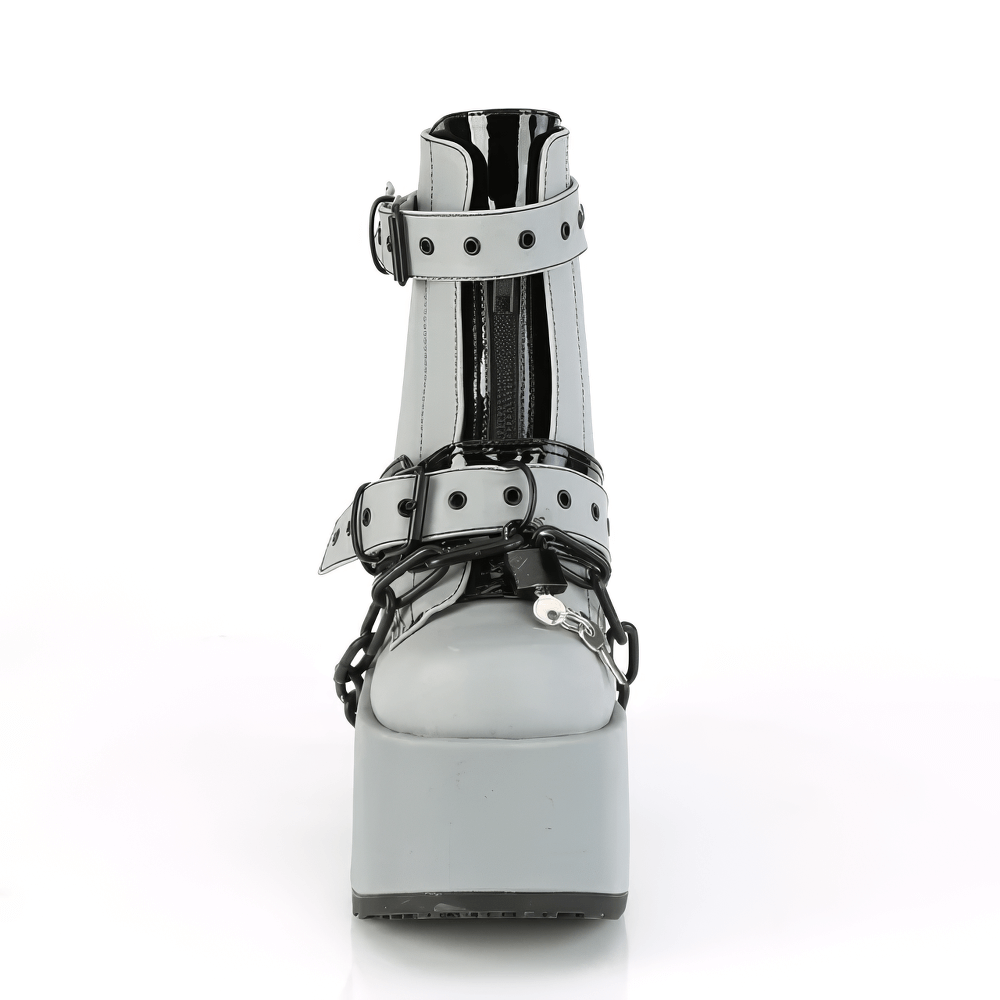 Demonia glossy gray punk style ankle boots with chains, showcasing a towering heel and reflective vegan leather.