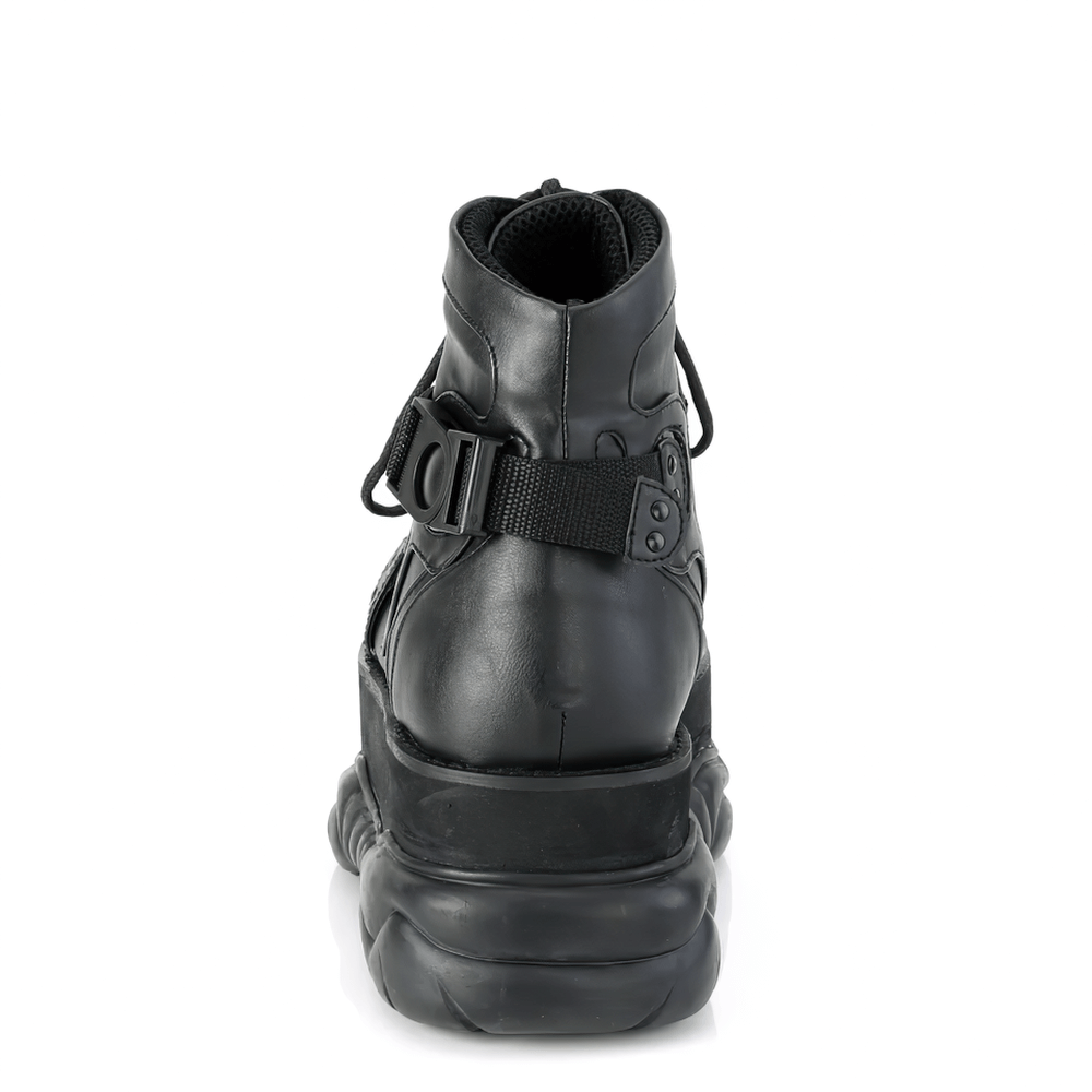 Back view of DEMONIA Gothic ankle boots featuring lace-up design and zig-zag strap with quick-release buckle.