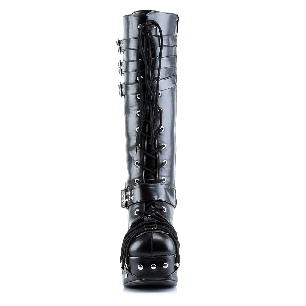 Demonia Gothic lace-up knee boots with studs and straps, featuring a dramatic platform and edgy corset-style design.