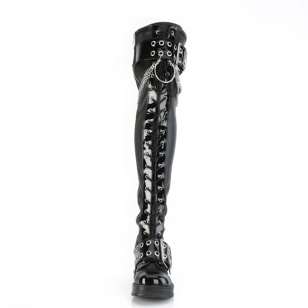 Demonia Gothic over-the-knee boots in black vegan leather with chains, buckles, and eyelet details.