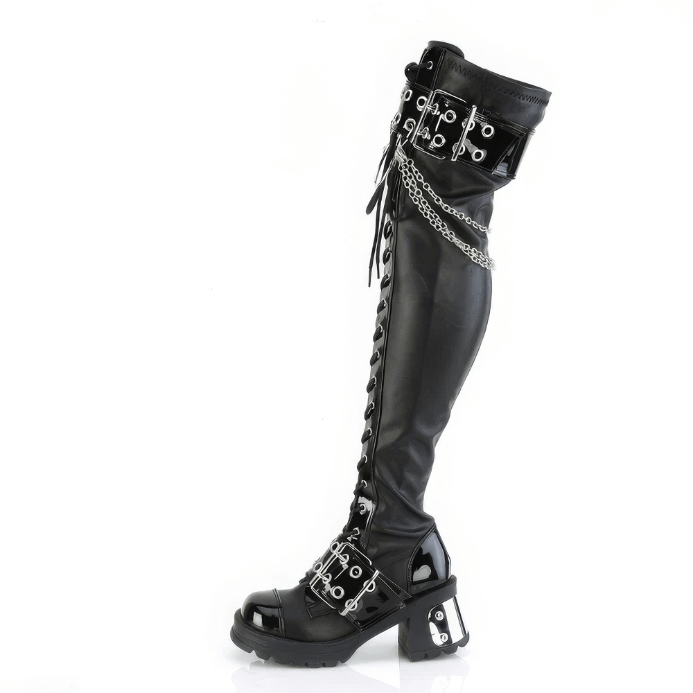 Demonia Gothic over-the-knee boots with chains and buckles, edgy chunky heel, eyelet details, black vegan leather.