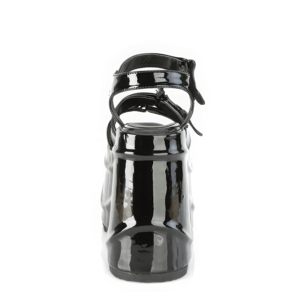 Back view of black vegan patent leather platform sandals with bat buckle strap, showcasing gothic style and adjustable straps.