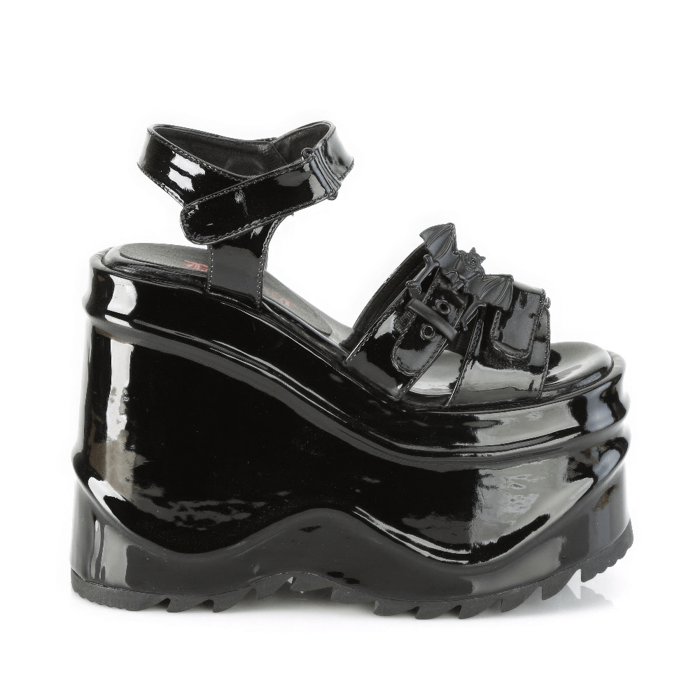 Demonia gothic platform sandals with bat buckle strap in shiny black vegan patent leather.