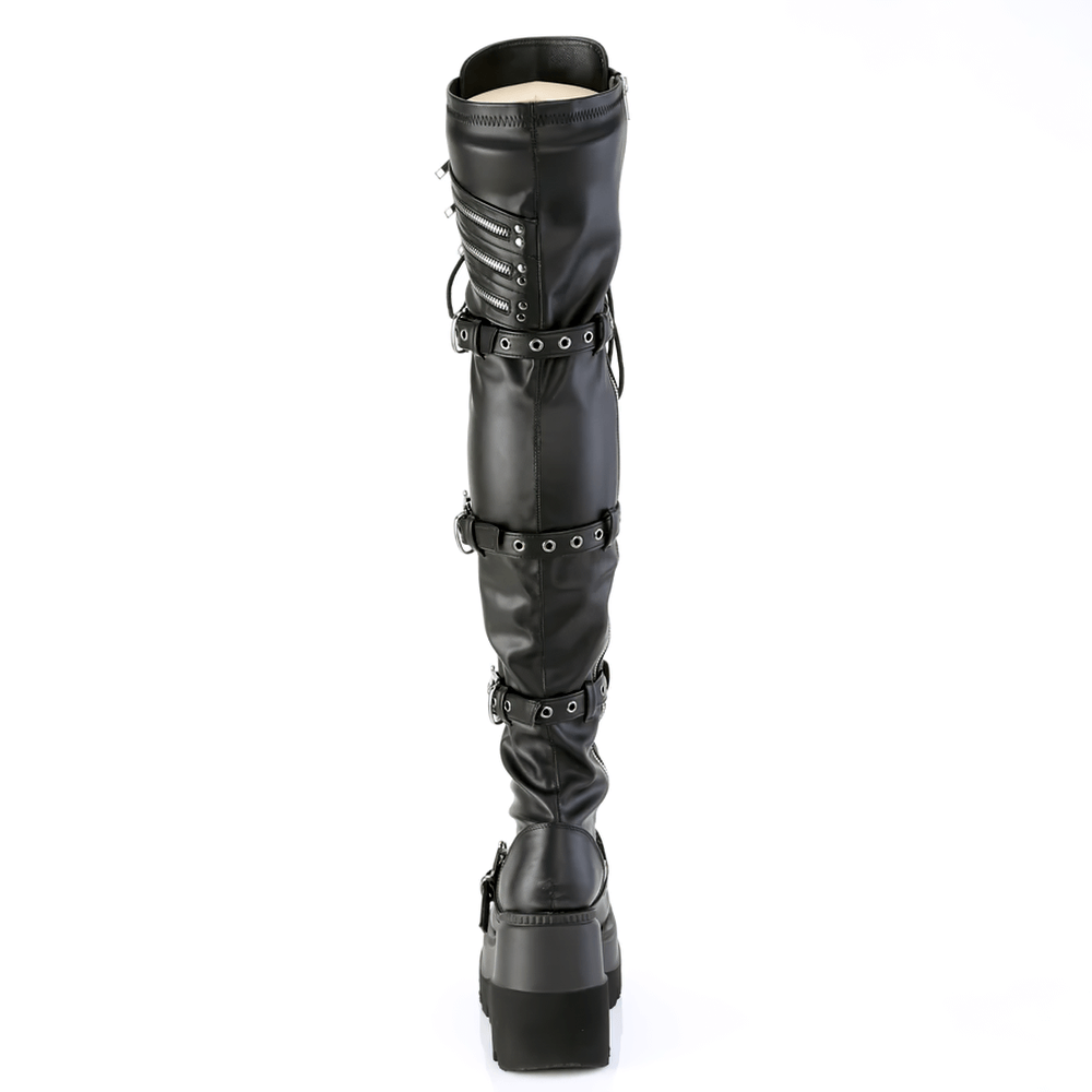 Demonia gothic thigh high boots with skull buckles and lace-up detail, made from black vegan leather.