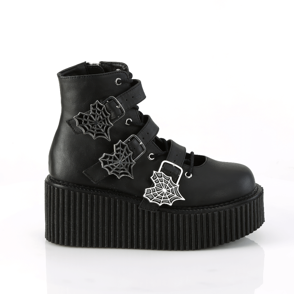 Black Gothic platform ankle boots with spider web buckle straps and 3-inch platform.