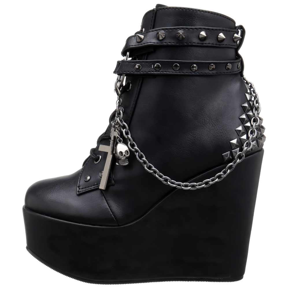 Demonia Gothic wedge platform boots featuring studded straps and pentagram details, perfect for edgy fashion lovers.