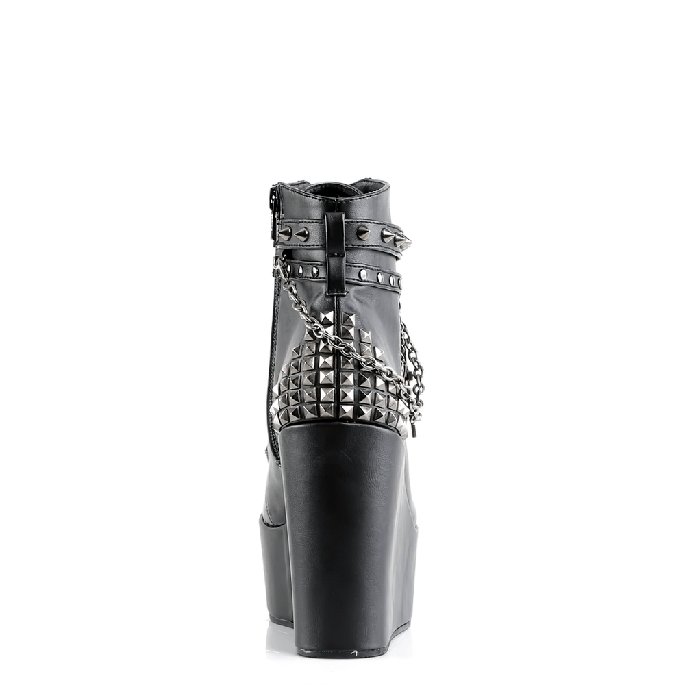 Demonia Gothic wedge platform boots featuring studded straps and pentagram detail, perfect for a stylish, edgy look.