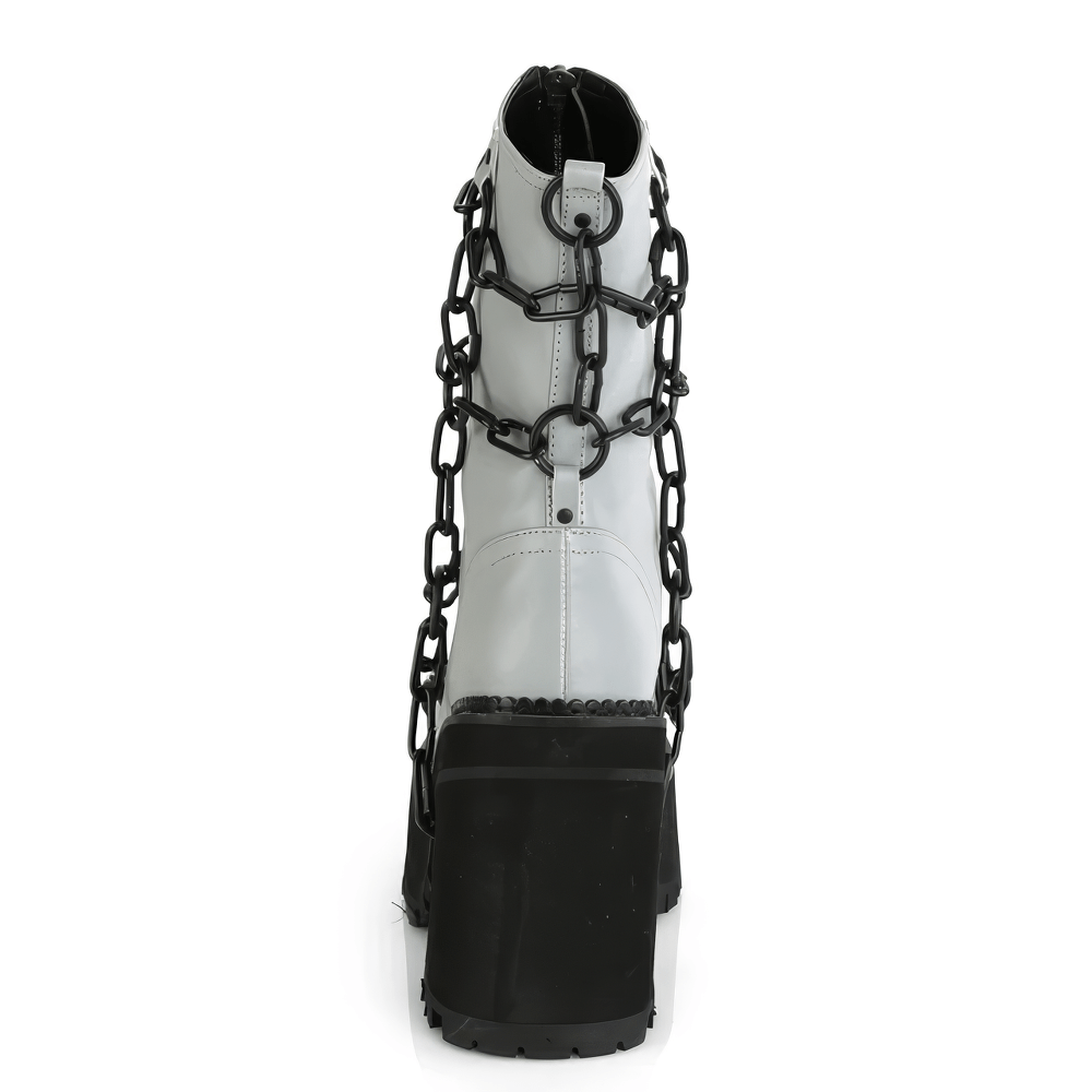 Women’s gray vegan leather ankle boot with chain detail and block heel, featuring a striking modern punk style.