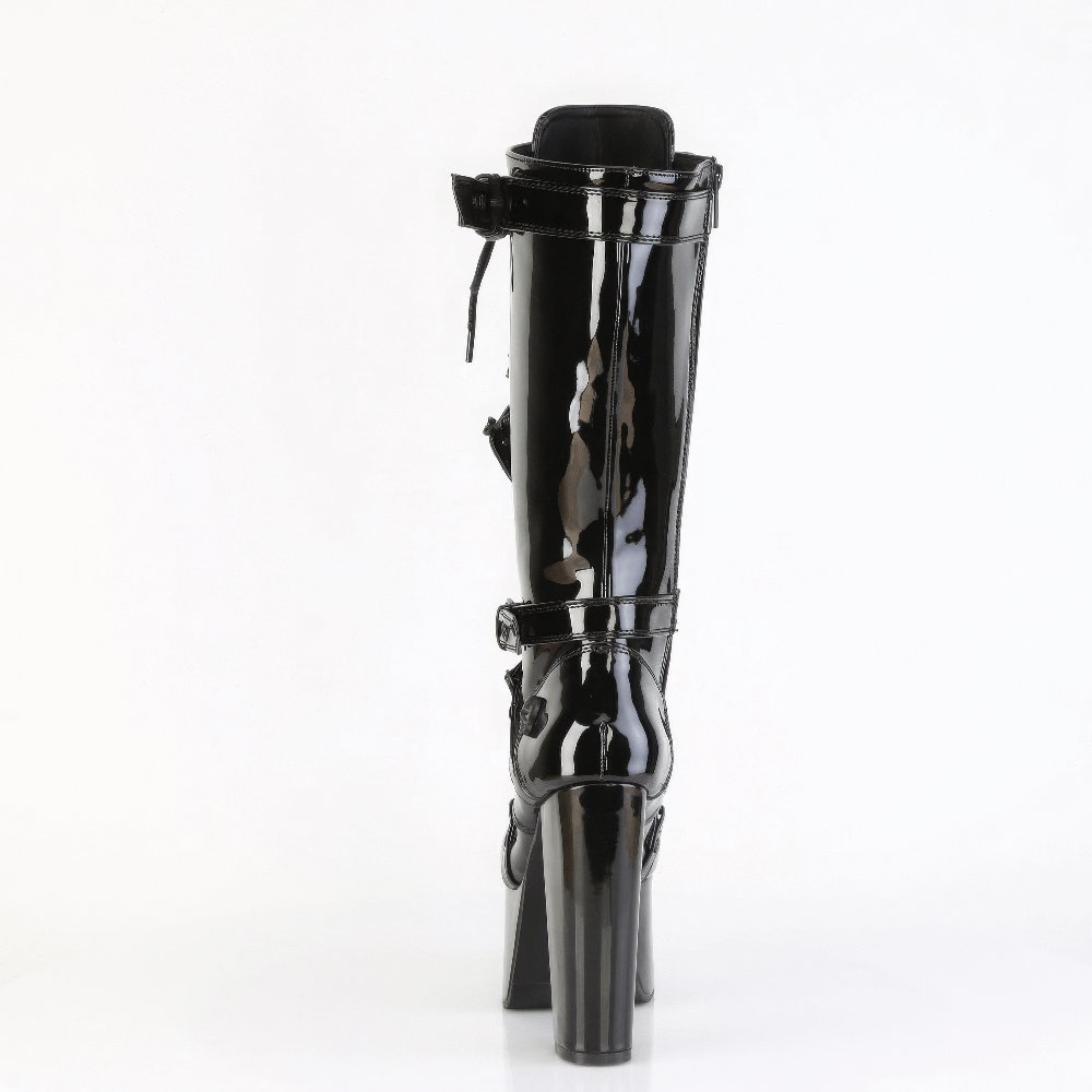 Back view of DEMONIA knee-high platform boots with skull studs and barbed wire chain, featuring vegan patent leather.