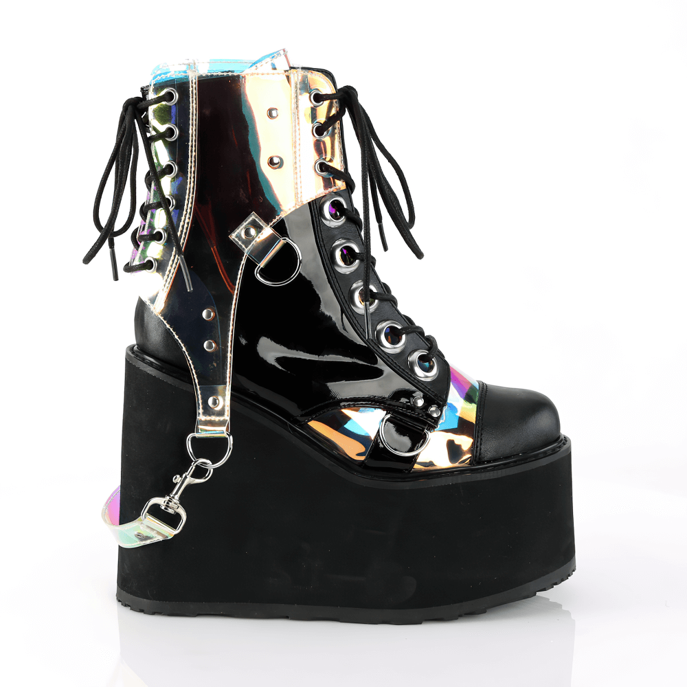 Demonia holographic wedge platform boots with bondage straps and lace-up design, perfect for alt-fashion lovers.