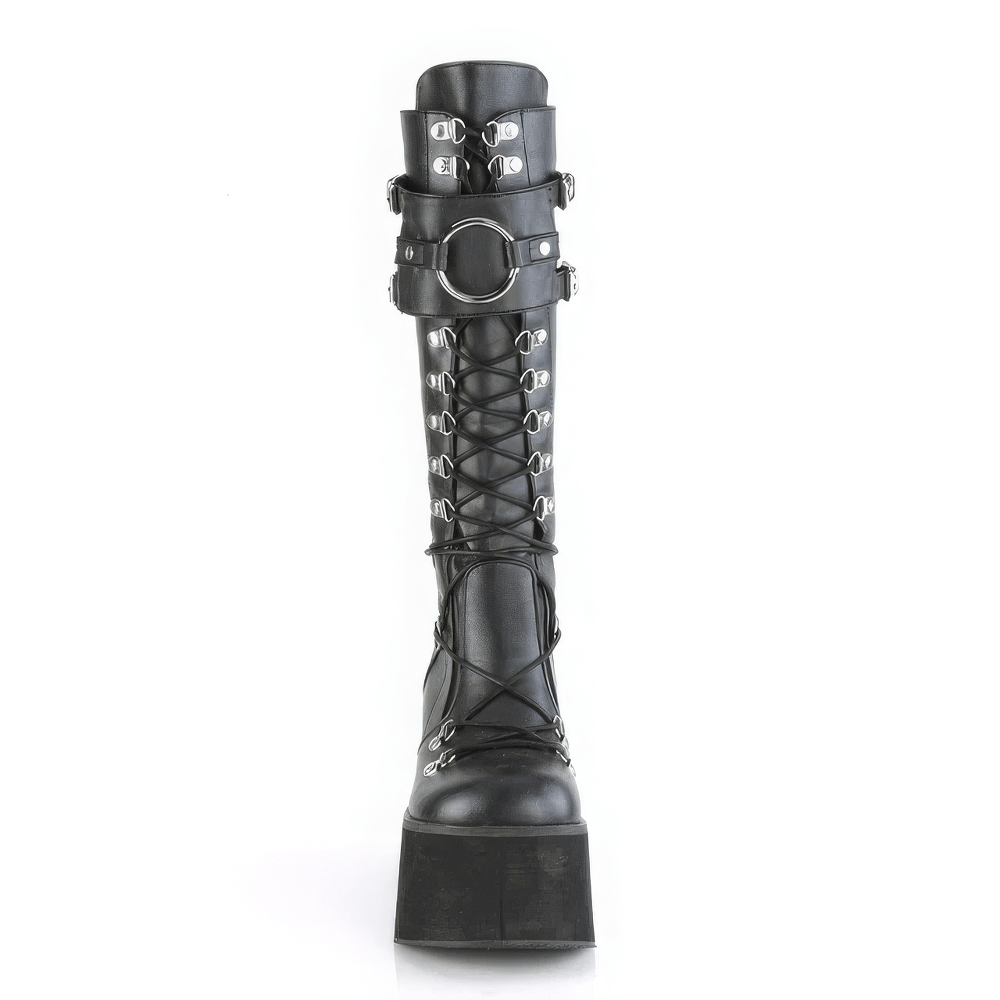 Black knee-high lace-up platform boots with oversized O-ring and metal details, perfect for an edgy style.