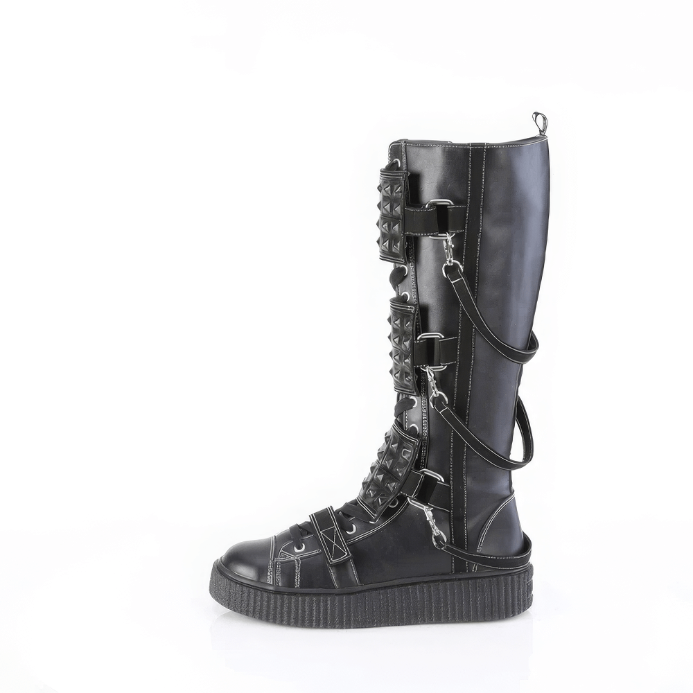 Demonia knee-high platform boots with studded straps and lace-up detail, perfect for an edgy, rebellious look.