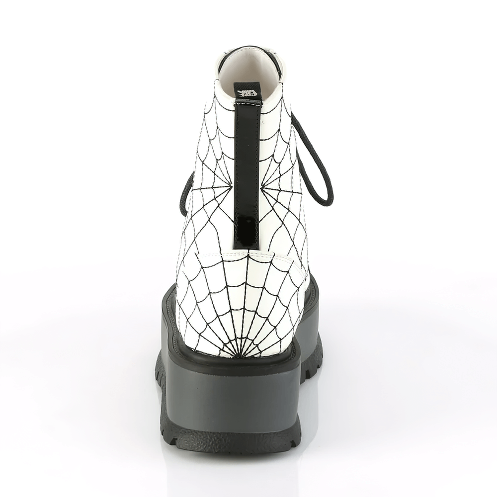 Demonia lace-up ankle boots with embroidered spider web design and 2" platform in vegan leather.