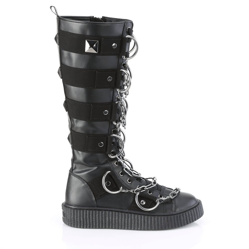 Demonia lace-up knee-high creeper boot featuring chain detail, pyramid stud, and striped panels for edgy style.