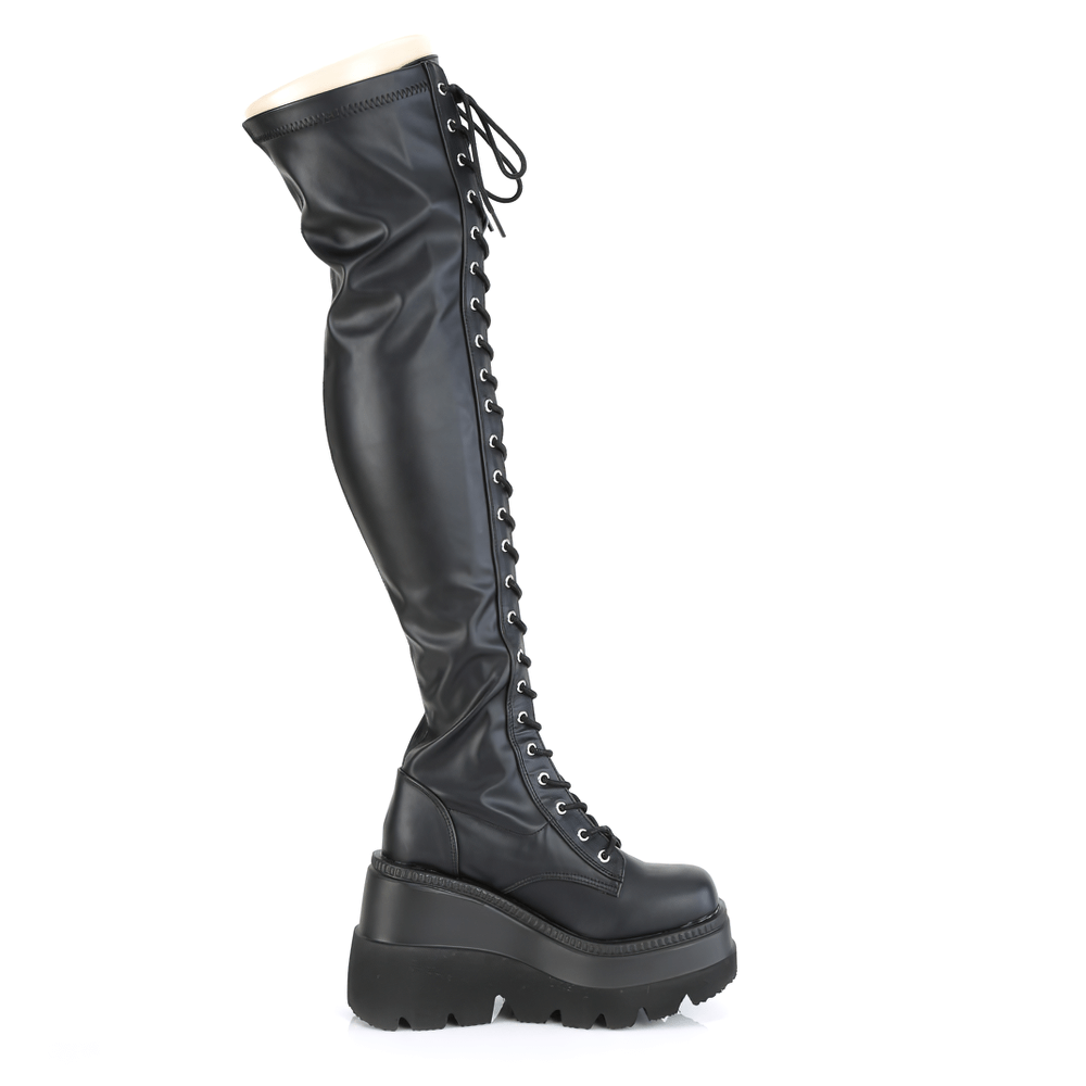 Demonia lace-up platform boots with zipper, black stretch vegan leather, 4.5-inch wedge sole, bold gothic style.