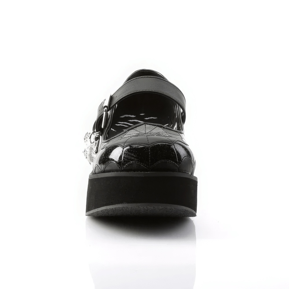Front view of Demonia Mary Jane platform shoes with spider web design and elegant spider charm.