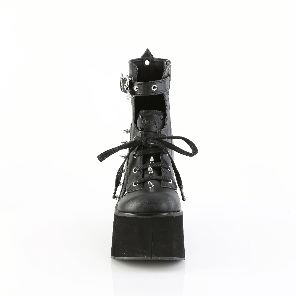 Front view of Demonia women's spiked ankle boots with skull buckle, metal detailing, and 4.5" platform.