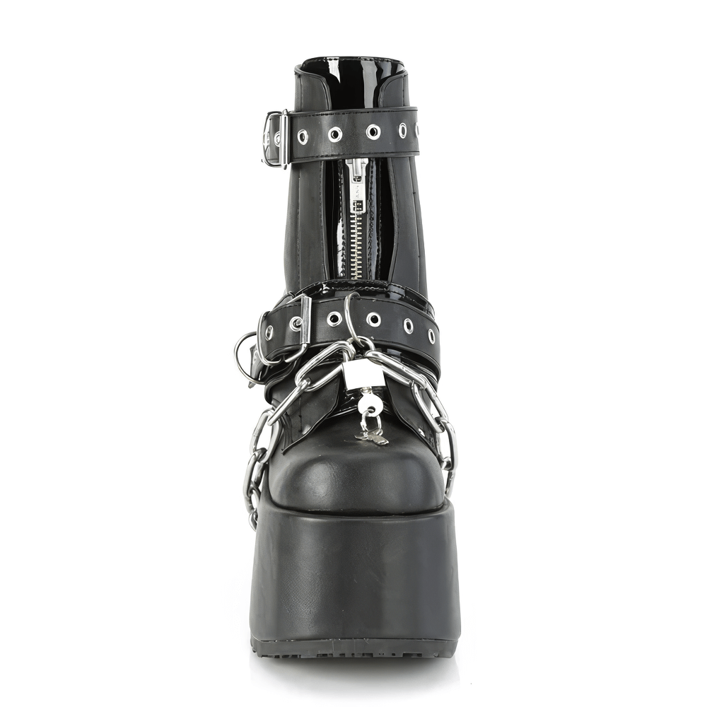 Daring DEMONIA women's ankle boots featuring chunky heel, chain detail, and metal accents for bold style.