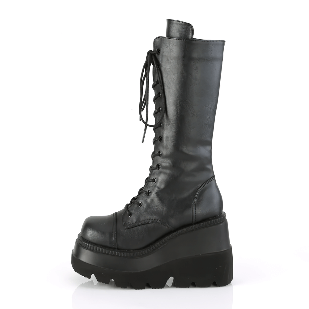 Demonia mid-calf lace-up platform boots in sleek black vegan leather with a bold wedge heel.