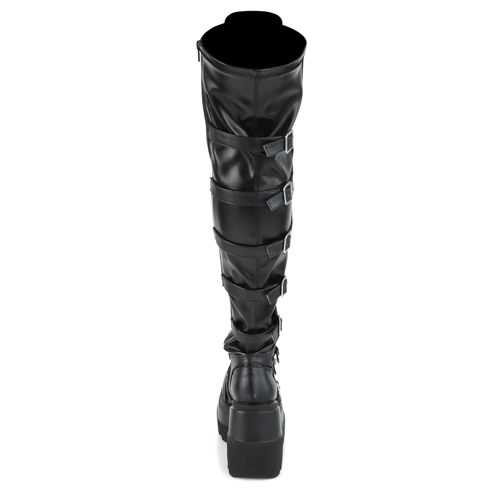 Over-the-knee black vegan leather boots with buckles and a platform heel, perfect for a stylish and bold look.