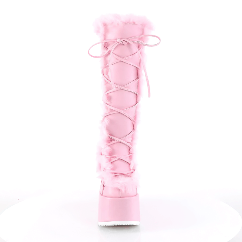 Stylish Demonia pink knee-high platform boots with faux fur trim and lace-up design.