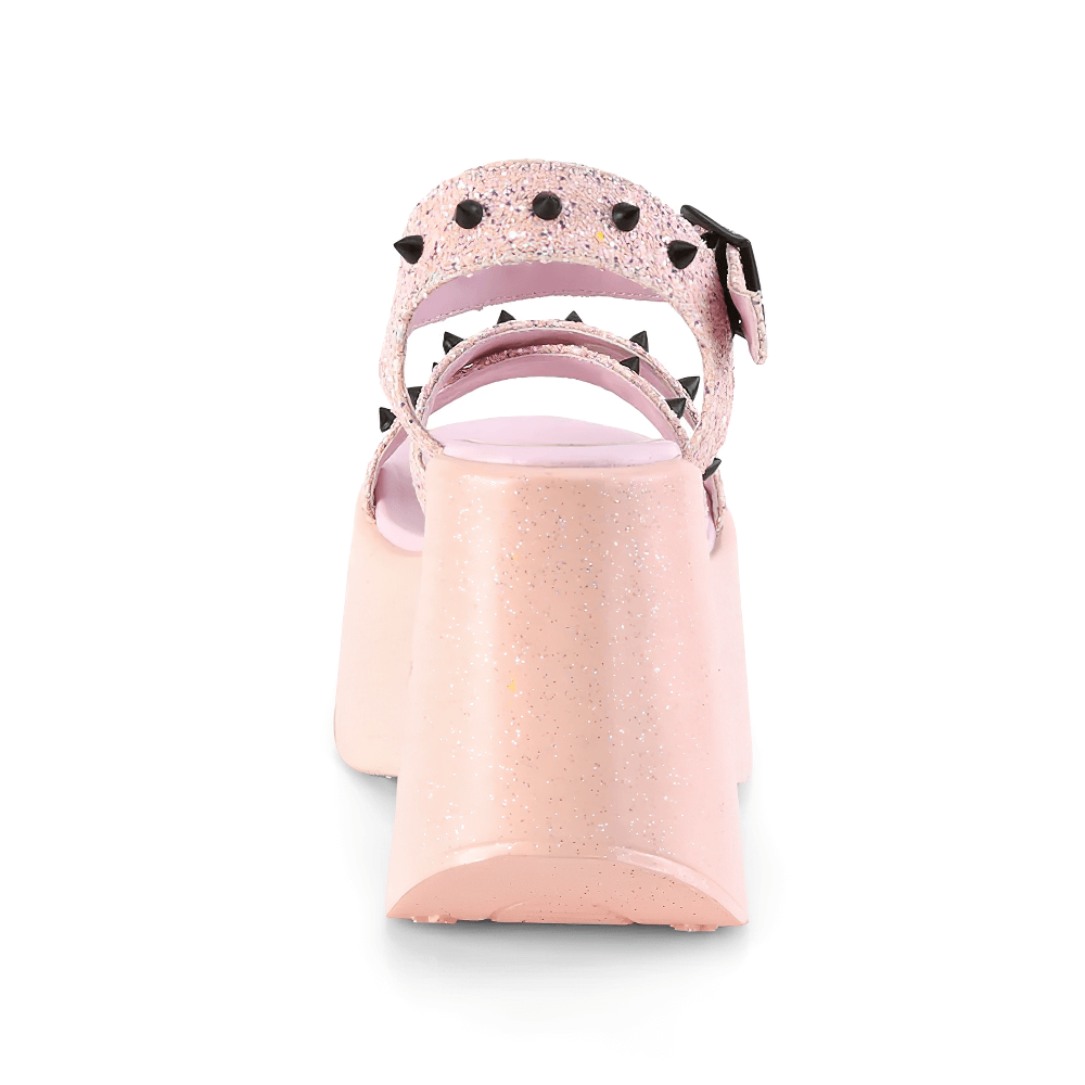 Back view of Demonia pink glitter star wedge sandals featuring spike accents and a secure ankle strap.
